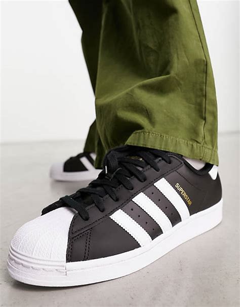 adidas super star zwart met wite strepen|adidas superstar zwart.